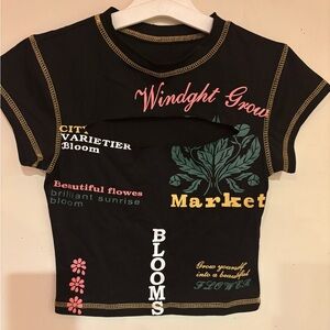 small shirt with random words/designs